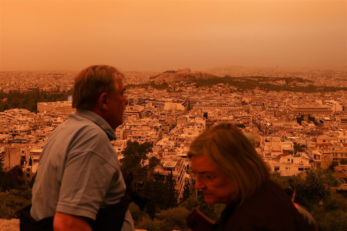 <i>Costas Baltas/Anadolu Agency/Getty Images via CNN Newsource</i><br/>Dust from the Saharan desert covers Athens in an orange haze on April 23.