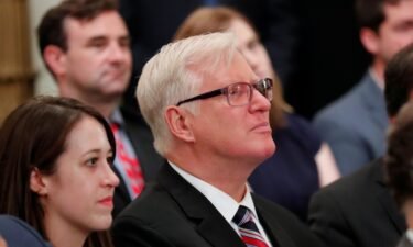 Gateway Pundit publisher Jim Hoft listens as U.S. President Donald Trump speaks during a "social media summit" meeting with prominent conservative social media figures in the East Room of the White House in Washington