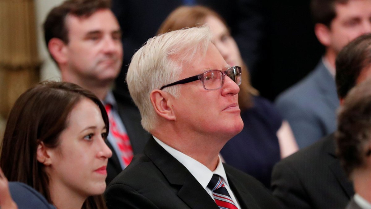 Gateway Pundit publisher Jim Hoft listens as U.S. President Donald Trump speaks during a "social media summit" meeting with prominent conservative social media figures in the East Room of the White House in Washington