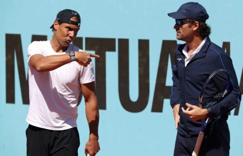 Nadal speaks to coach Carlos Moyá as he prepares to compete at the Madrid Open.