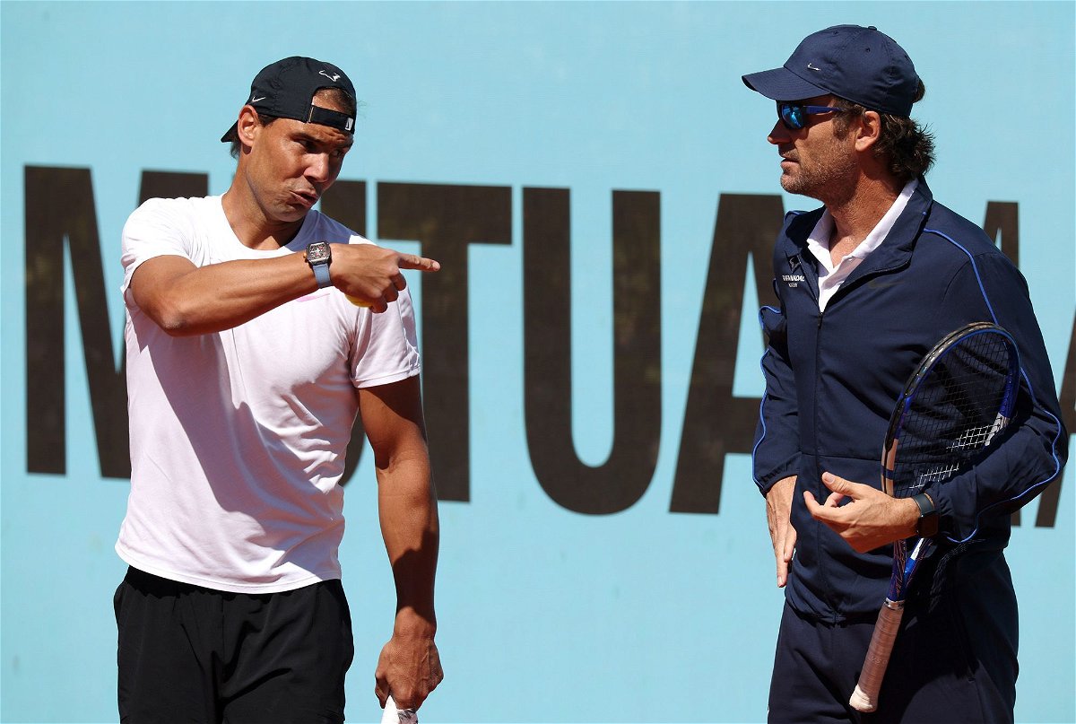 <i>Clive Brunskill/Getty Images via CNN Newsource</i><br/>Nadal speaks to coach Carlos Moyá as he prepares to compete at the Madrid Open.