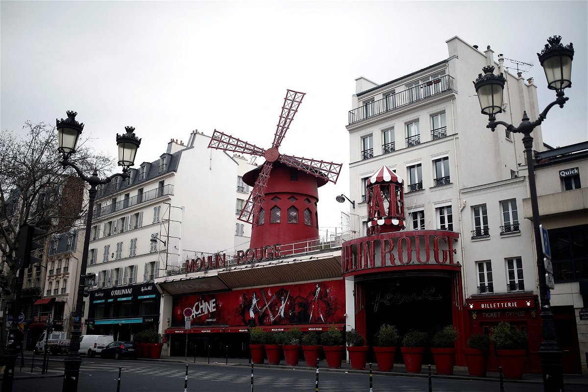 What the world famous cabaret club usually looks like when its eponymous red windmill is securely intact.