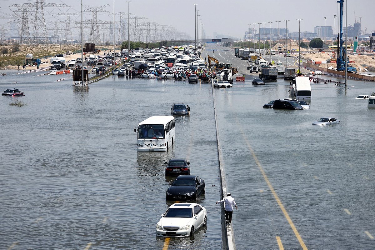 <i>Francois Nel/Getty Images via CNN Newsource</i><br/>A general view of abandoned vehicles on a flooded highway can be seen on April 18