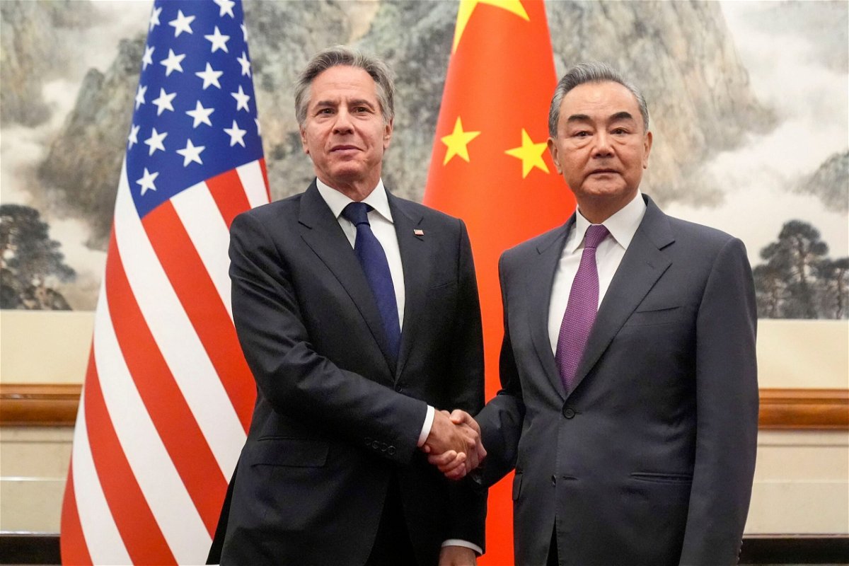 <i>Mark Schiefelbein/Pool/AFP/Getty Images via CNN Newsource</i><br/>US Secretary of State Antony Blinken shakes hands with China's Foreign Minister Wang Yi in Beijing on April 26.