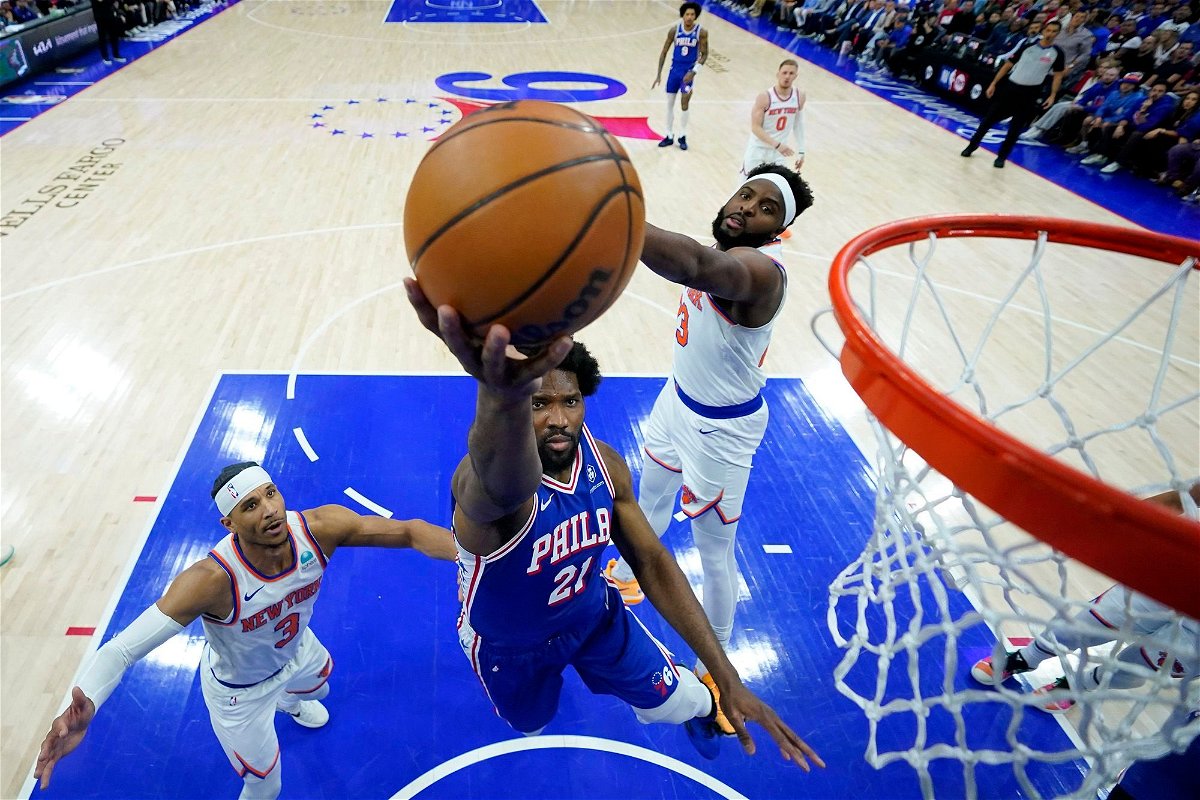 Joel Embiid drives to the rim during the game.