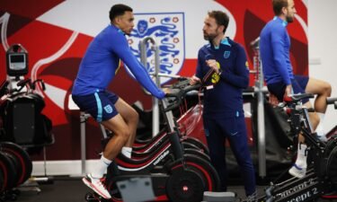 Southgate talks to Alexander-Arnold in the gym at St George's Park on October 11