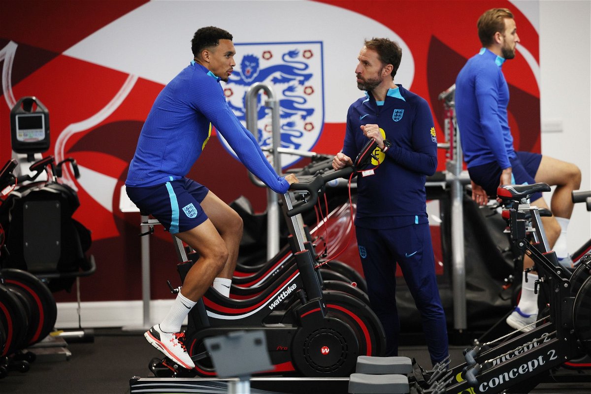 Southgate talks to Alexander-Arnold in the gym at St George's Park on October 11