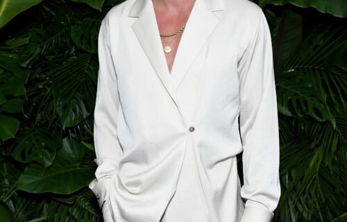 Pine in crisp cream pajama-style suiting at a Chanel event in Beverly Hills