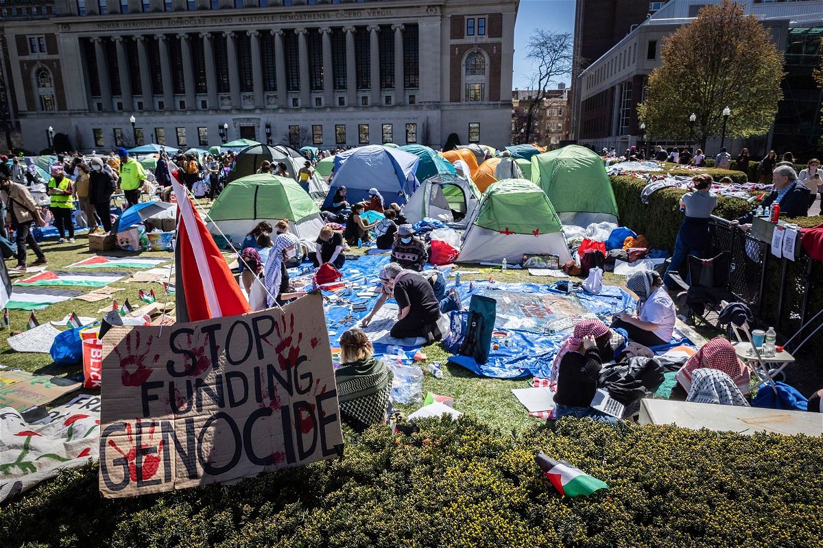 <i>Stefan Jeremiah/AP via CNN Newsource</i><br/>Columbia student protesters are demanding divestment. A sign sits erected at the pro-Palestinian demonstration encampment at Columbia University in New York on April 22.