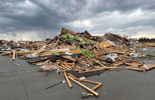 Debris is seen from a destroyed home northwest of Omaha