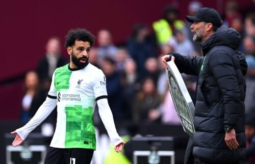 Mohamed Salah (left) appears to argue with manager Jürgen Klopp during the match against West Ham on April 27.