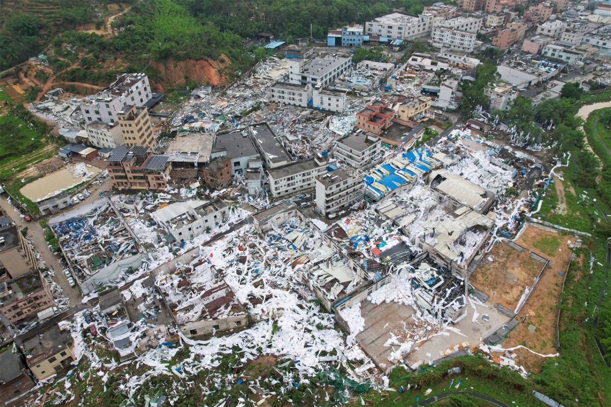 <i>Chen Jimin/China News Service/VCG/Getty Images via CNN Newsource</i><br/>An aerial view of a factory whose roof was ripped off by the tornado in Guangzhou