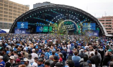 Crowds fill an area during the second round of the NFL Draft on Friday in Detroit.