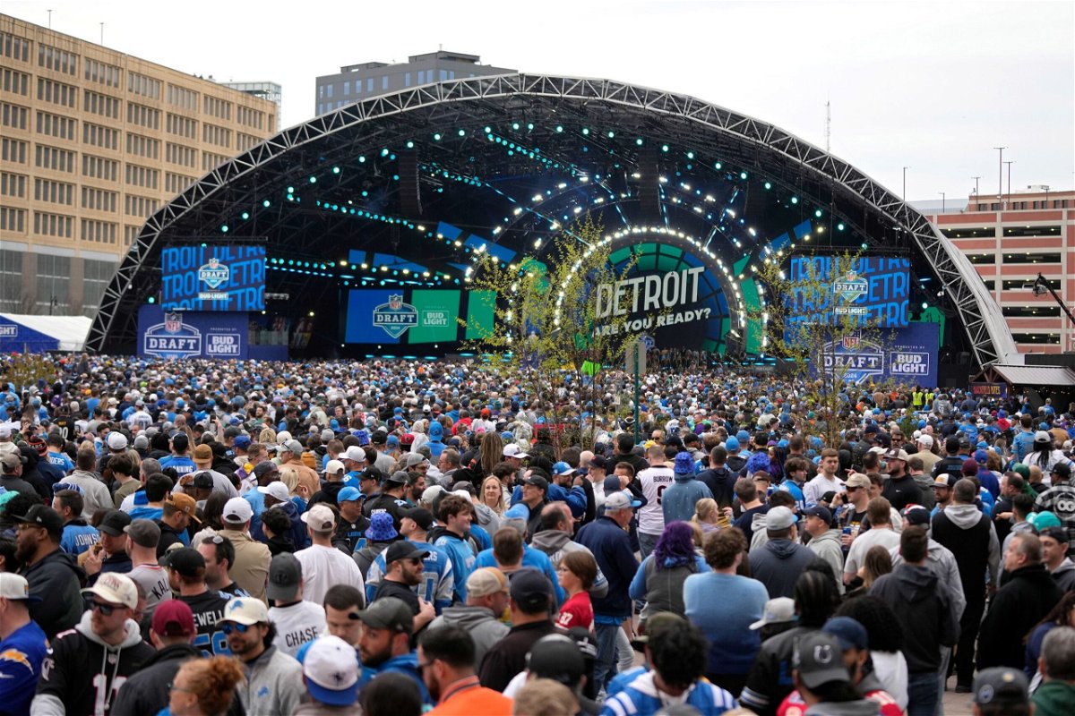 <i>Carlos Osorio/AP via CNN Newsource</i><br/>Crowds fill an area during the second round of the NFL Draft on Friday in Detroit.