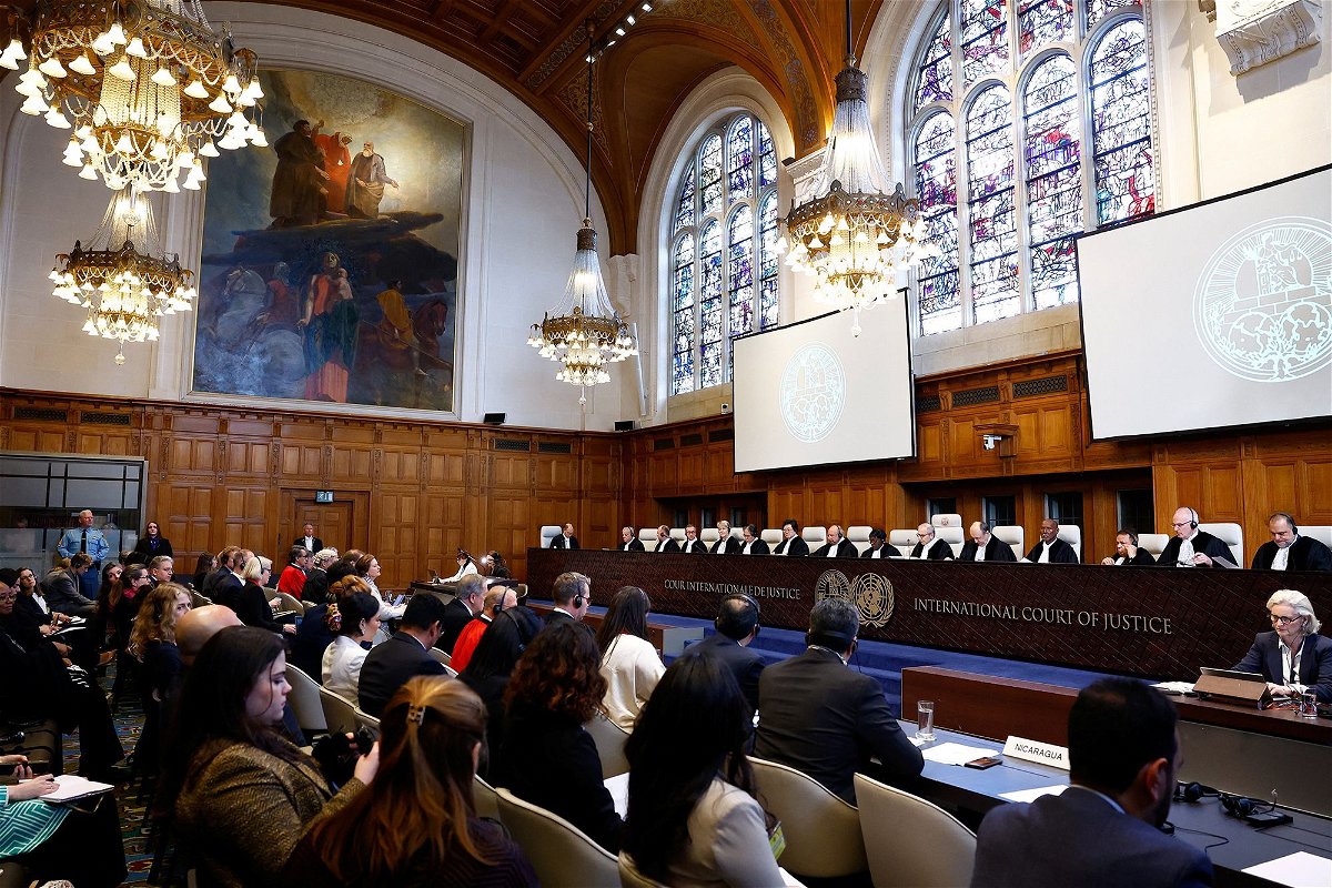 Judges and delegates sit in the courtroom as the International Court of Justice (ICJ) hears the case against Germany brought by Nicaragua.