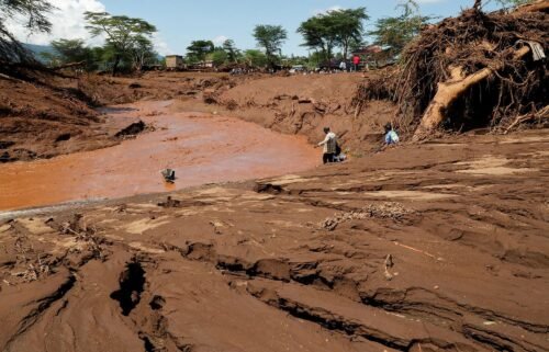 Residents gather at the river bed to search for missing people in Mai Mahiu on April 29. At least 91 people are missing after heavy flooding across Kenya’s capital