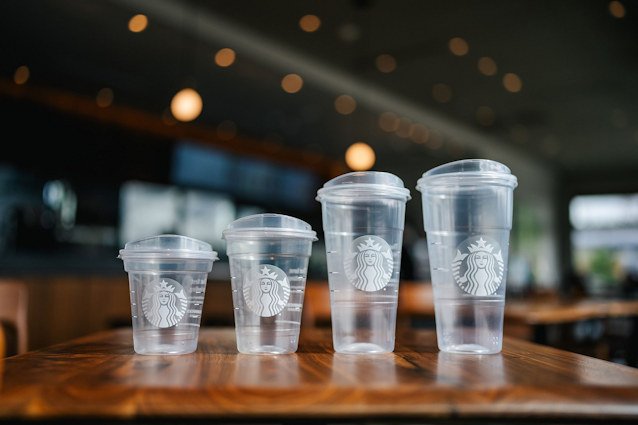 Starbucks is rolling out redesigned plastic cups to its US and Canada locations this month.