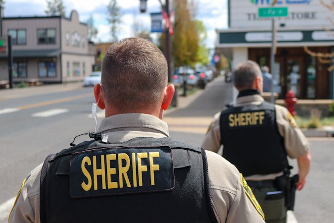Deschutes County sheriff's deputies on foot patrol in Sisters