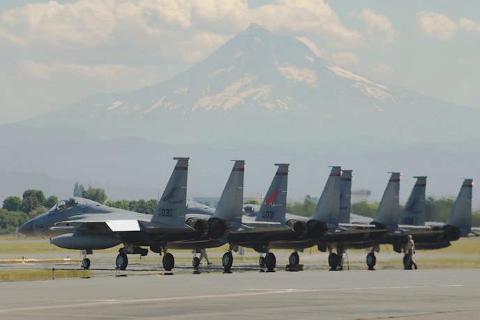 Oregon Air National Guard F-15C Eagles, assigned to the 142nd Fighter Wing prepare for an afternoon training mission as part of dissimilar aircraft combat training (DACT) on Aug. 13, 2019, at the Portland Air National Guard Base,.