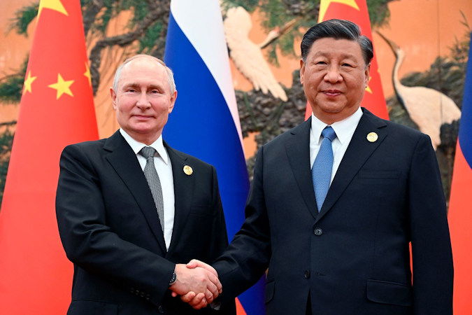 Chinese President Xi Jinping, right, and Russian President Vladimir Putin pose for a photo prior to their talks on the sidelines of the Belt and Road Forum in Beijing, China, in October 2023.