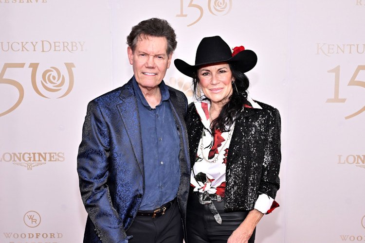 Randy Travis and Mary Davis attend the Kentucky Derby 150 at Churchill Downs on May 4 in Louisville, Kentucky.