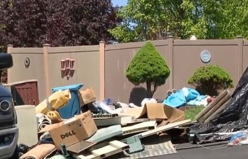 Neighbors in the Edgemede section of Plum said they have been battling to get piles of what they call junk and garbage strewn across their neighbor's property removed for two years.