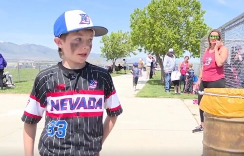 Kashton Carter looks like any other 8-year-old having the time of his life playing baseball