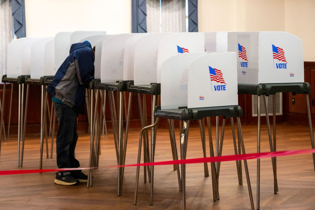 AI could offer ‘enhanced opportunities’ to interfere in 2024 election, DHS warns as a voter casts his ballot in the Maryland primary election in Chester on May 14.