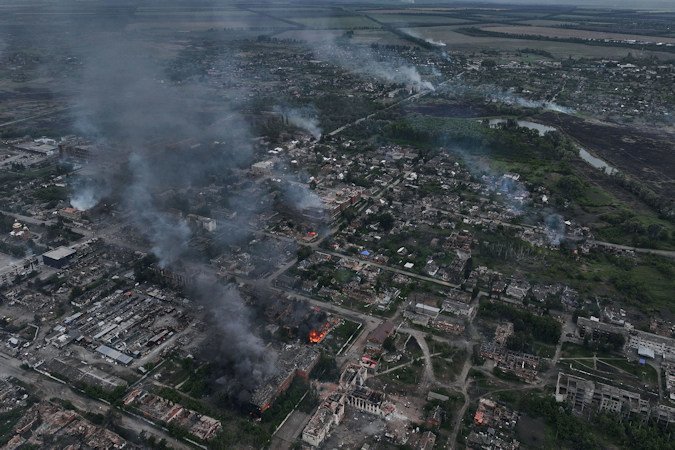 Smoke rises from the Ukranian boarder city of Vovchansk, which is bombarded daily by heavy artillery on May 17, 2024.