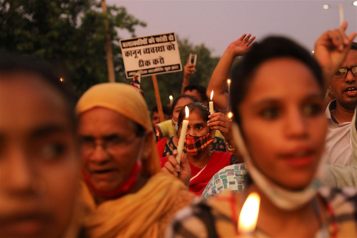 <i>Anushree Fadnavis/Reuters via CNN Newsource</i><br/>People attend a candlelit protest against rape and gender violence in New Delhi