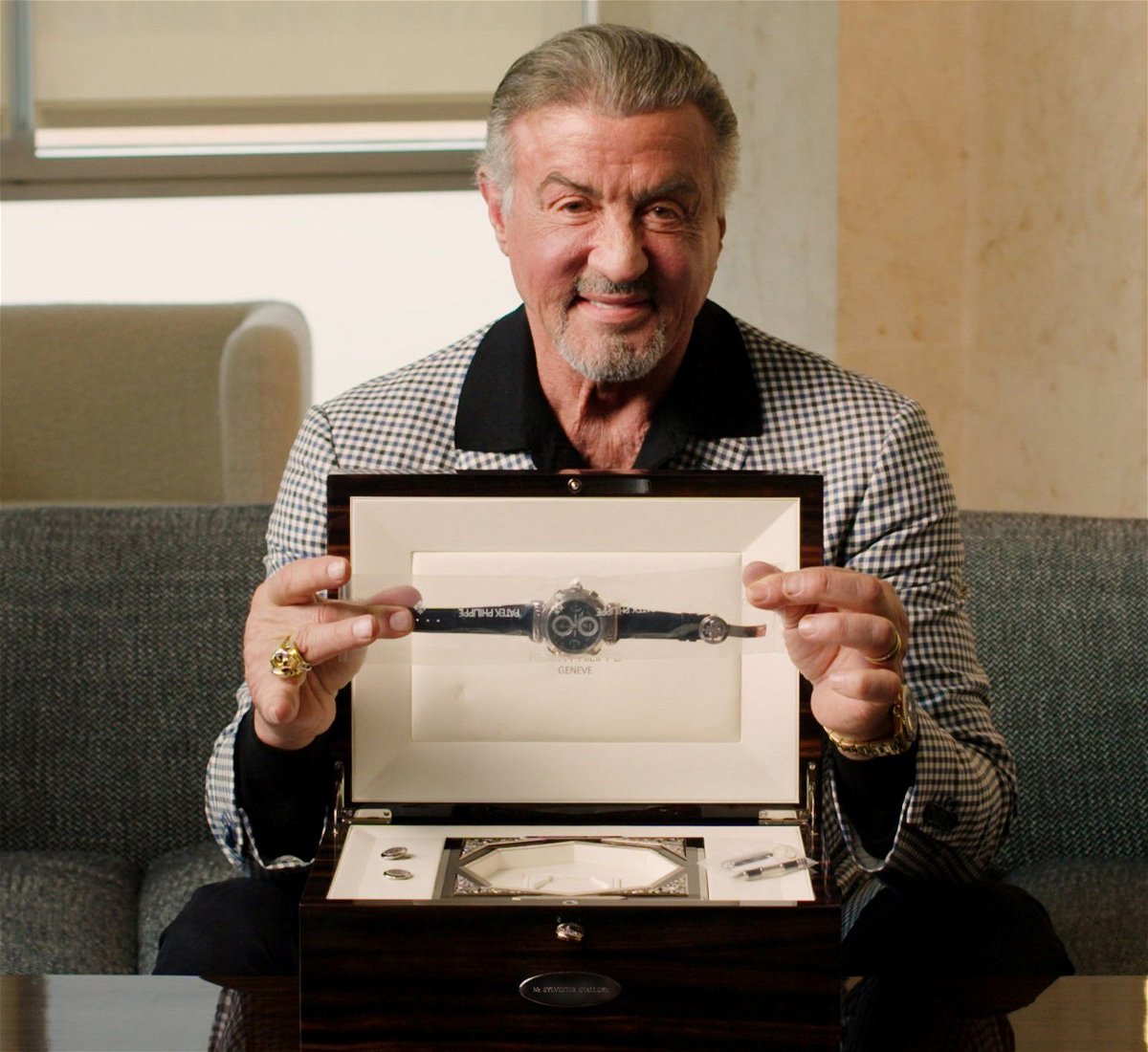 <i>Sotheby's via CNN Newsource</i><br/>Sylvester Stallone with the Patek Philippe Grandmaster Chime.