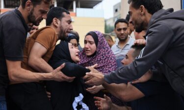 Palestinians mourn the death of their relatives following an Israeli airstrike on the refugee camp of Jabalia in the Gaza Strip in October 2023.