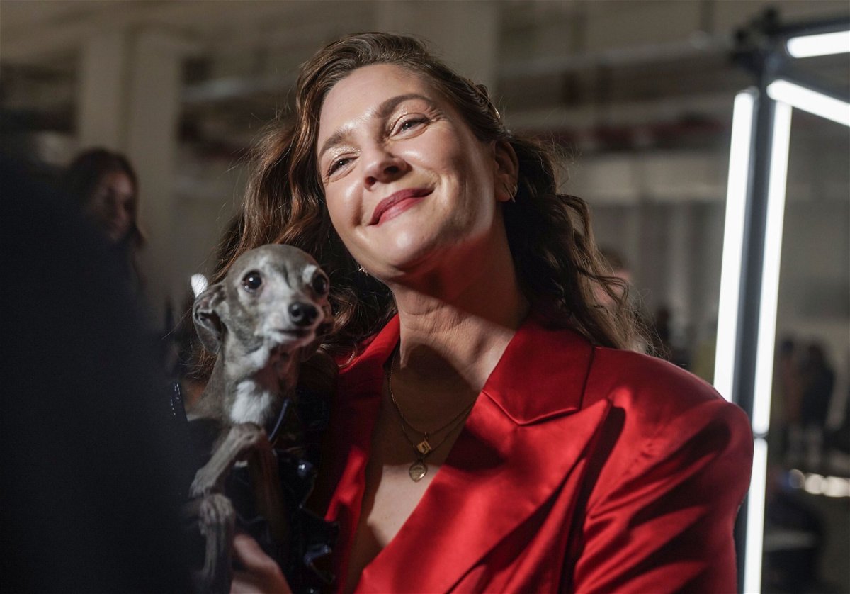 <i>Bebeto Matthews/AP via CNN Newsource</i><br/>Drew Barrymore holds dog influencer Tika the Iggy during an interview in 2022. Barrymore adores animals. She said she wept the most writing her memoir “Wildflower” when she shared a story about her beloved dog