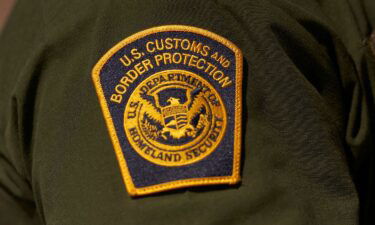 A US Customs and Border Protection patch on the arm of an agent in the Jacumba mountains on October 6