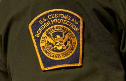 A US Customs and Border Protection patch on the arm of an agent in the Jacumba mountains on October 6
