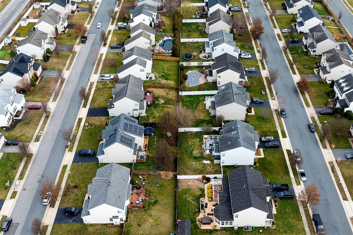 <i>Jim Watson/AFP/Getty Images via CNN Newsource</i><br/>Closing costs are an often-overlooked expense when buying a home. This aerial picture shows homes near the Chesapeake Bay in Centreville