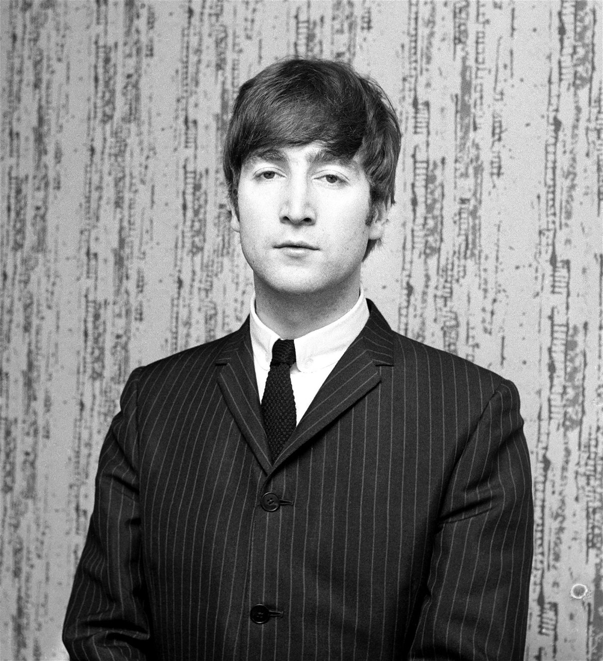 <i>ITV/Shutterstock via CNN Newsource</i><br/>Lennon pictured in December 1963.