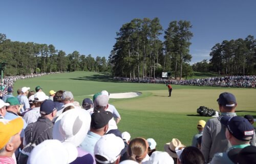 Tiger Woods putts on the second green during the final round of the 2024 Masters.