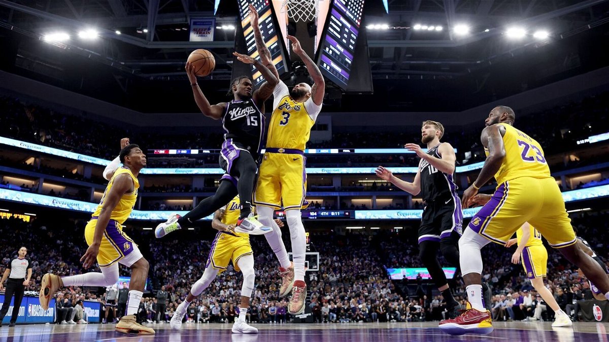 <i>Ezra Shaw/Getty Images via CNN Newsource</i><br/>Davion Mitchell #15 of the Sacramento Kings goes up for a shot on Anthony Davis #3 of the Los Angeles Lakers. Warner Bros. Discovery is in danger of losing NBA broadcast rights to NBCUniversal.