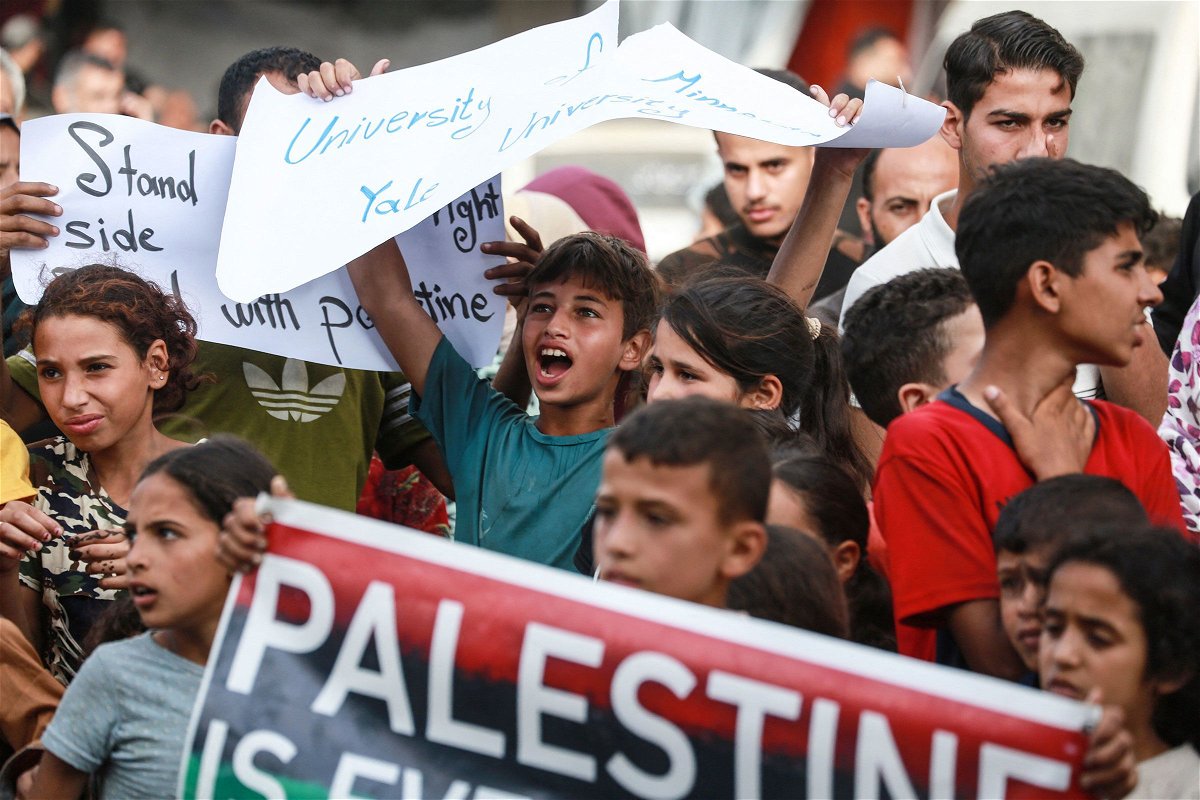 <i>AfP/Getty Images via CNN Newsource</i><br/>Palestinians in Deir el-Balah stage a rally to thank pro-Palestinian student protesters in the US on May 1.