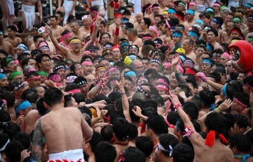 Men strip naked — except for a delicate piece of crotch-covering white loincloth — to take part in the naked festival at Konomiya Shrine on February 22.