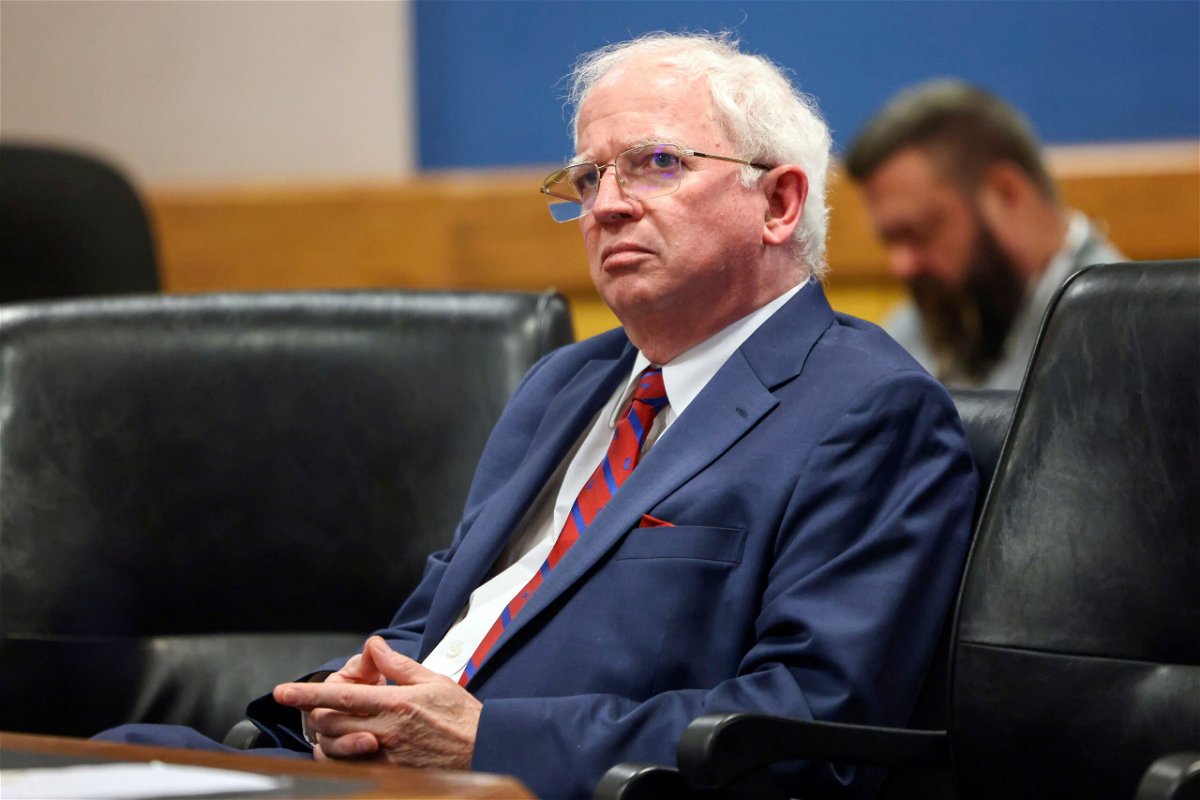 John Eastman listens during a hearing on the Georgia election interference case on January 19 in Atlanta. Eastman wants to keep practicing law as he fights criminal charges stemming from the 2020 election efforts.