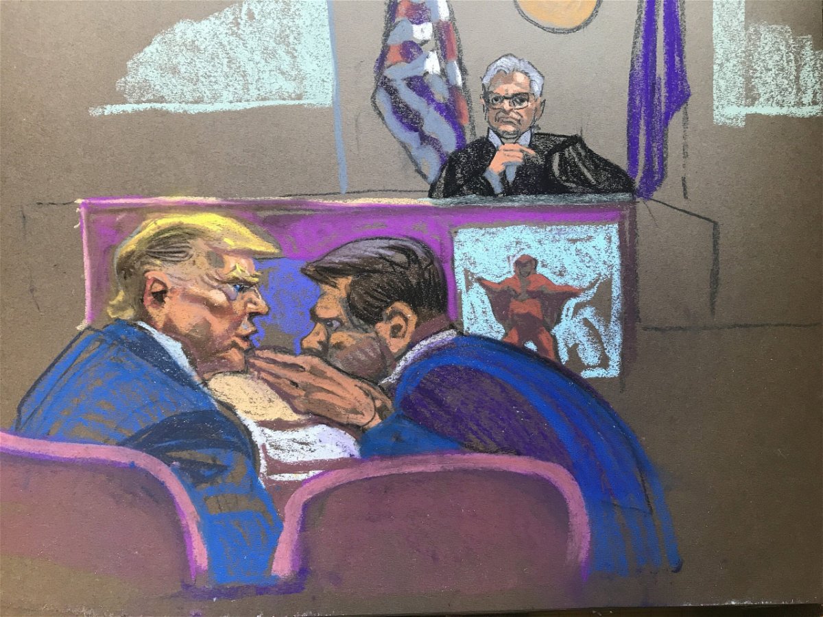 Former President Donald Trump whispers to attorney Todd Blanche during a gag order hearing on May 2. Examples of social media were being shown.