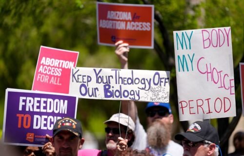 Arizona Democratic governor signs bill repealing 1864 abortion ban. Abortion rights supporters gather outside the Capitol in Phoenix on April 17