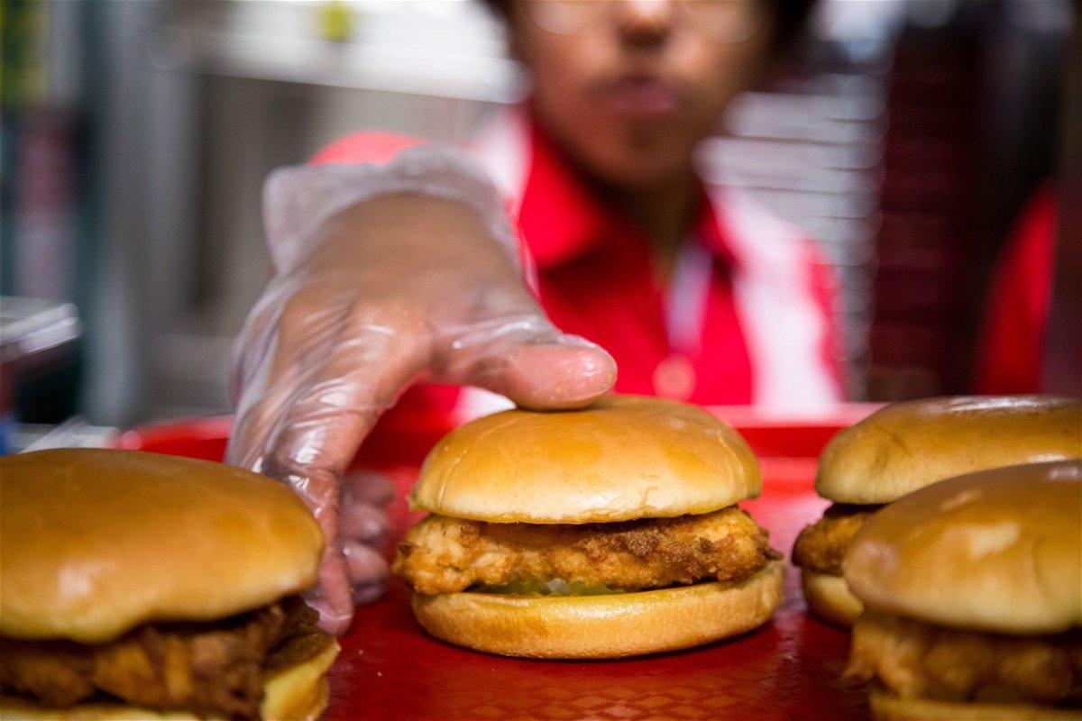 <i>Michael Nagle/Bloomberg/Getty Images via CNN Newsource</i><br/>Fried chicken sandwiches cooked at a grand-opening event for a Chick-fil-A restaurant in New York.