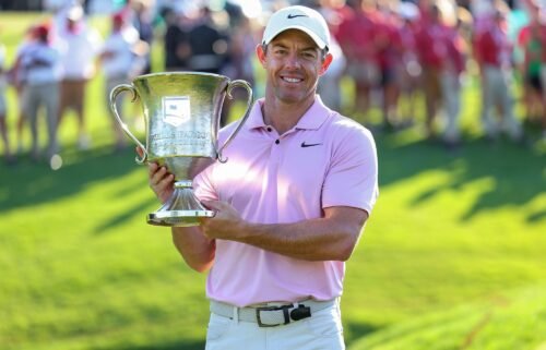 Rory McIlroy celebrates with the trophy after winning the 2024 Wells Fargo Championship at Quail Hollow Club in Clifton