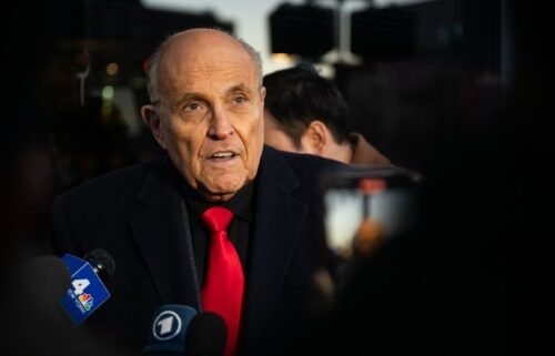 Rudy Giuliani speaks to members of the media where Republican candidate Florida Gov. Ron DeSantis was scheduled to host a campaign event on January 21