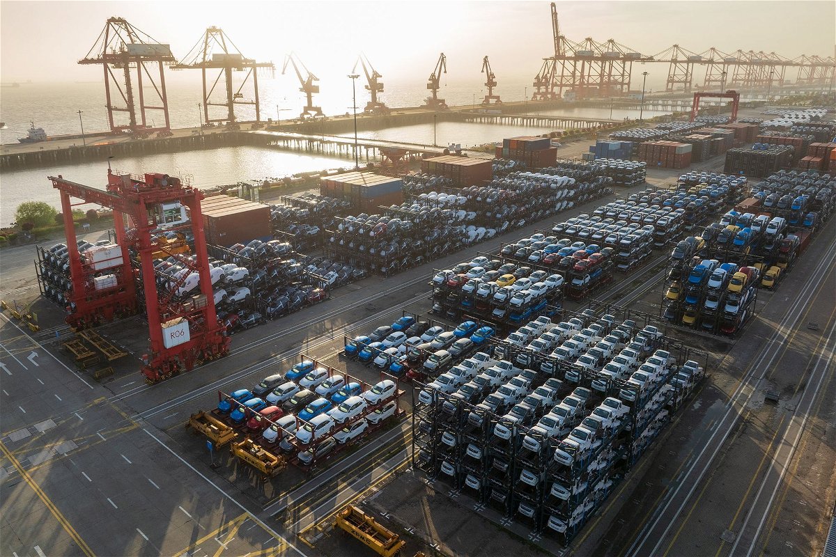 <i>Zhang Congyu/VCG/Getty Images via CNN Newsource</i><br/>Aerial view of vehicles waiting to be shipped at Taicang Port on April 19