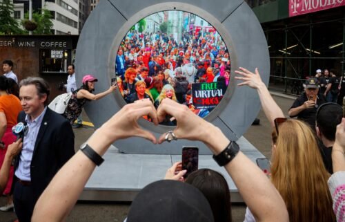 New Yorkers greet people in Dublin during the reveal of New York City's Portal on May 8.
