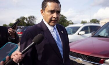 Rep. Henry Cuellar (D-Texas) speaks with reporters as he departs the U.S. Capitol May 7.